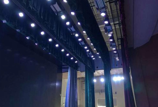 Stage top lighting arrangement, showcasing ceiling-mounted LED lights for even stage illumination